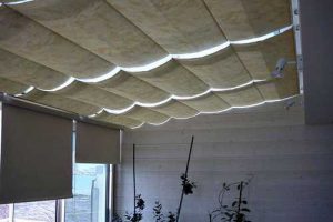 store velum toile déployée pour veranda